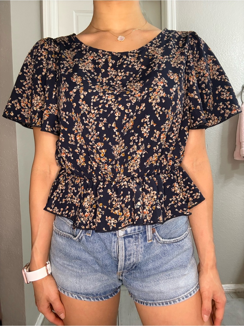 Navy Floral Peplum Short Sleeve Top